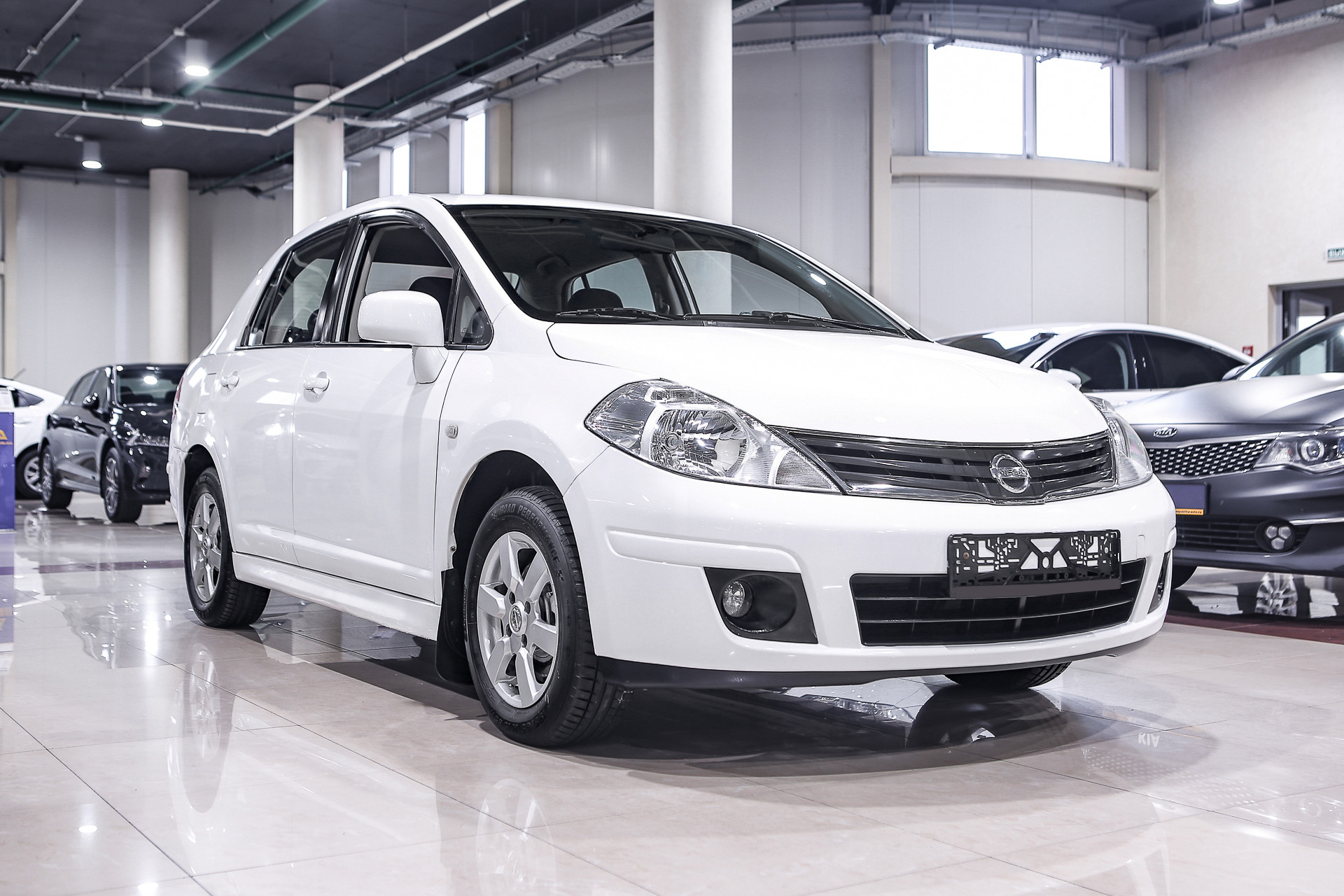 Купить Tiida с пробегом